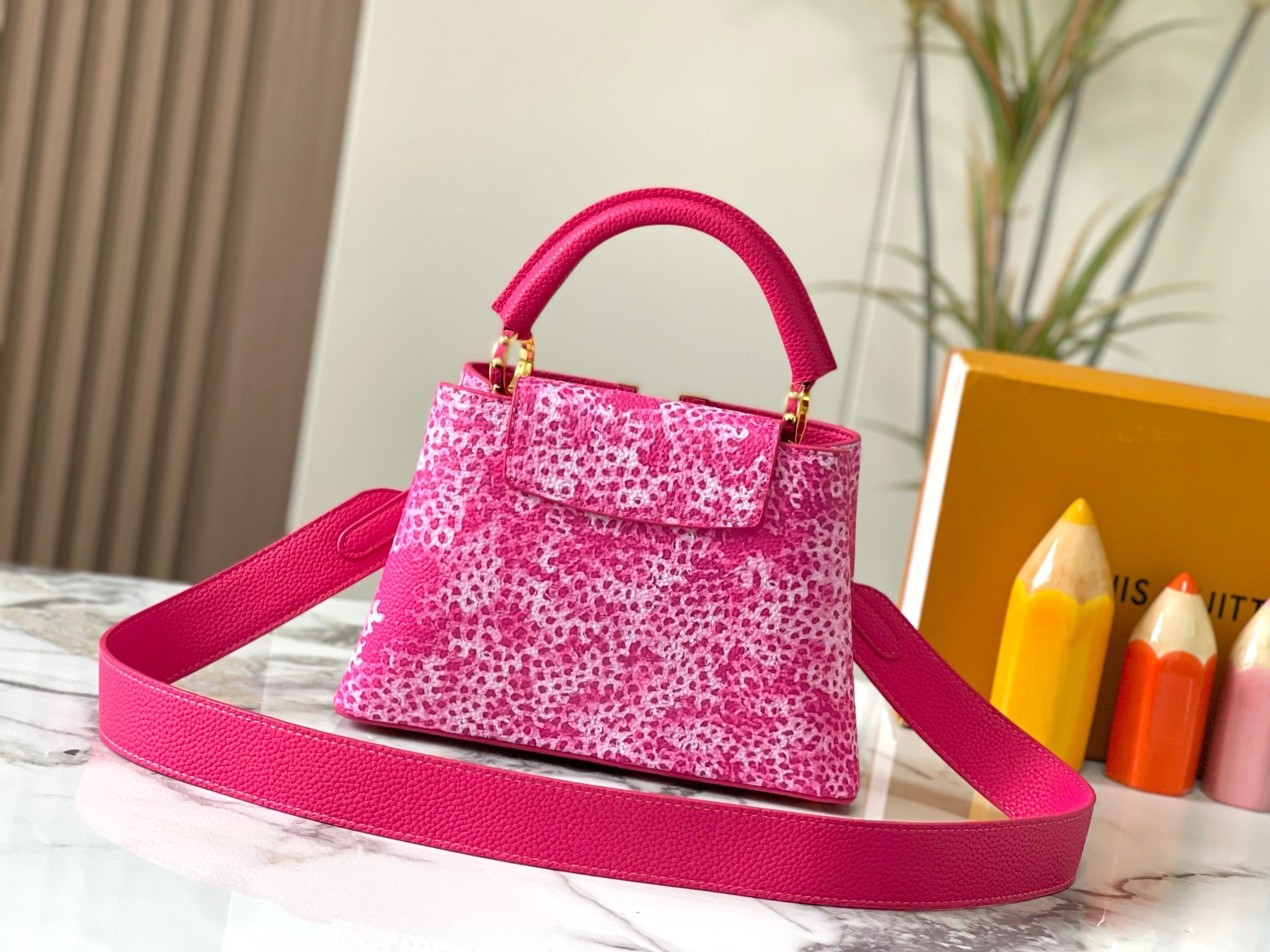 LO* Capucines handbags